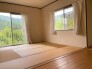 南・西側に窓の有る2階居室B